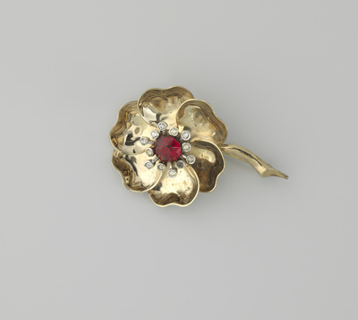 Broche van metaal en glas