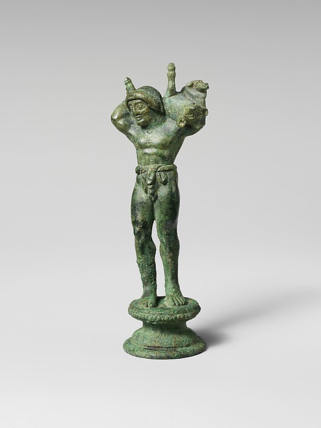Bronze statuette of a youth carrying a pig