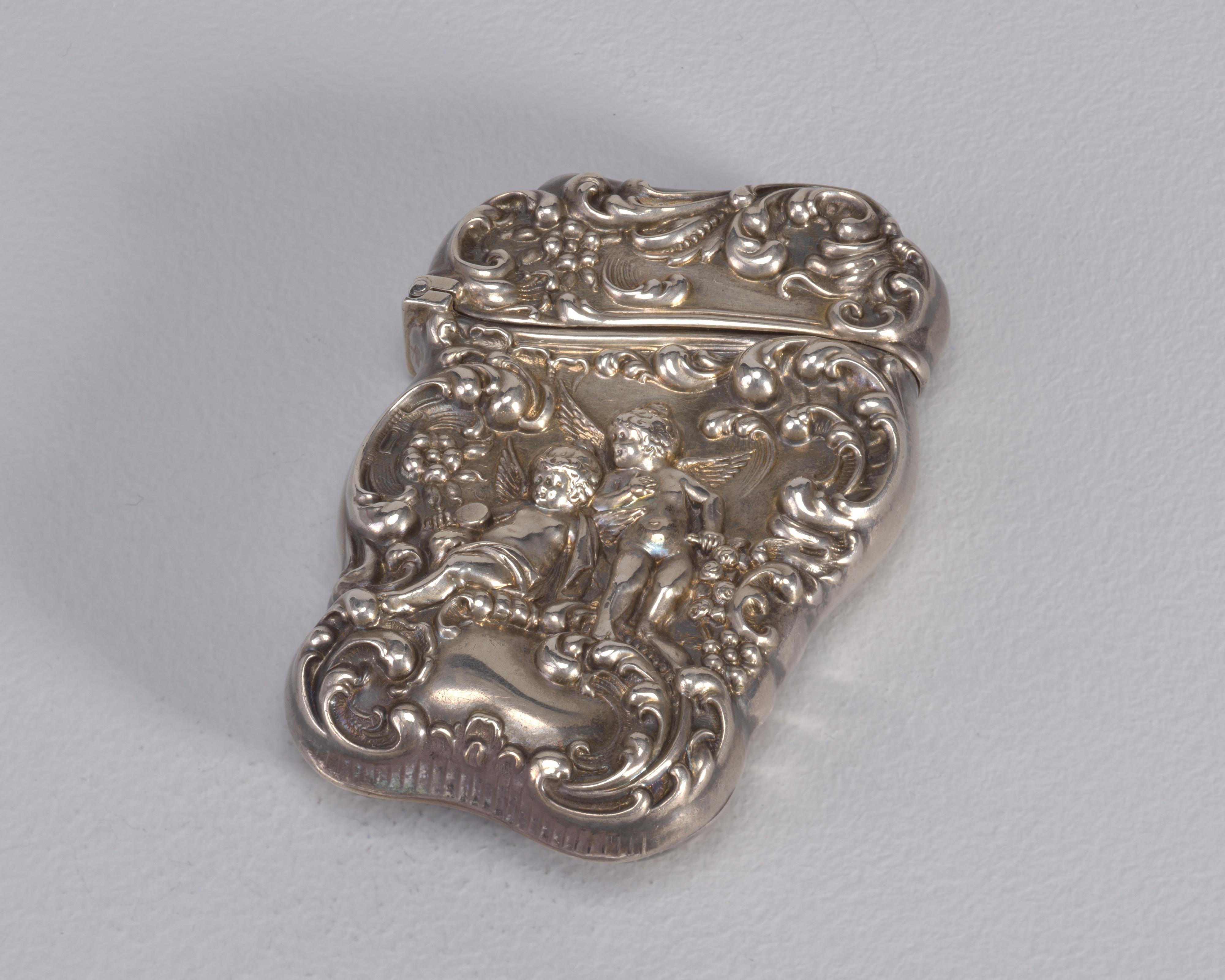 Cupids and Scroll Work