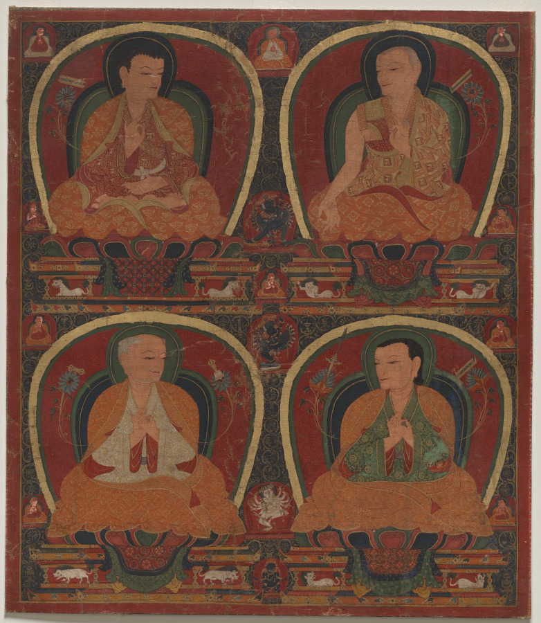 Four seated Masters