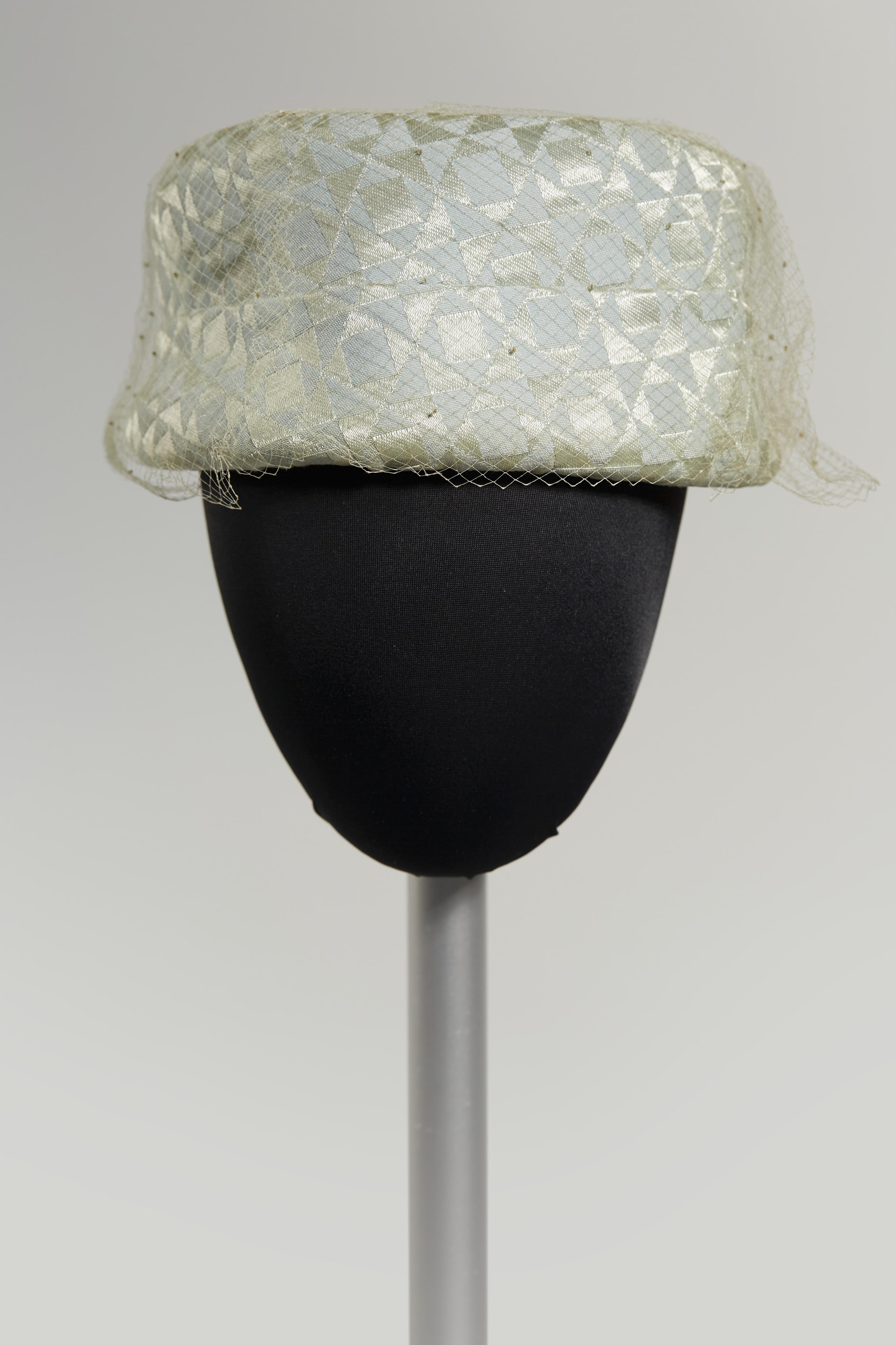 Light blue geometric patterned hat with veil