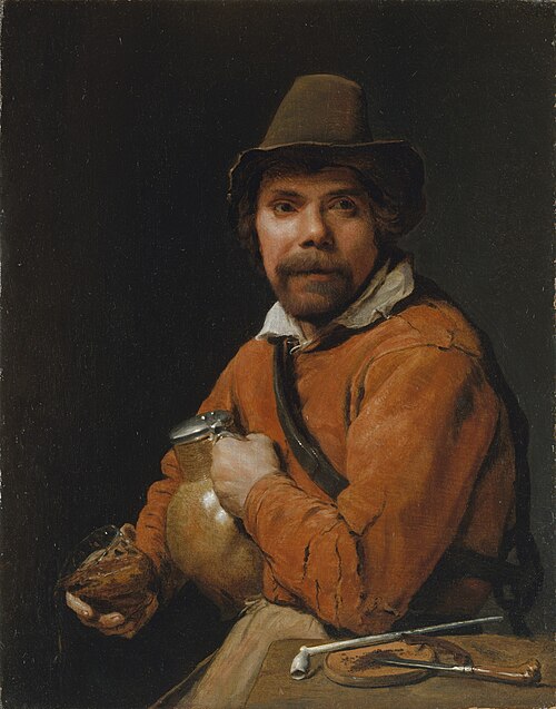 Man Holding a Jug