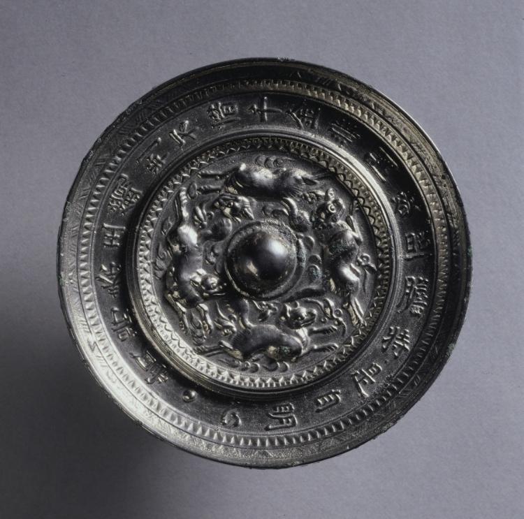 Mirror with Four Running Animals