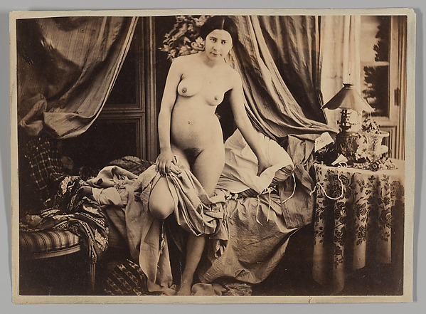 [Nude Standing by Bed]
