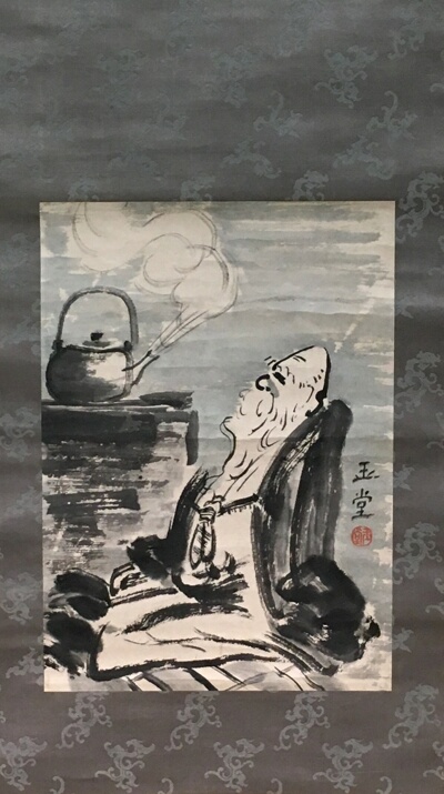 Old priest and tea kettle.