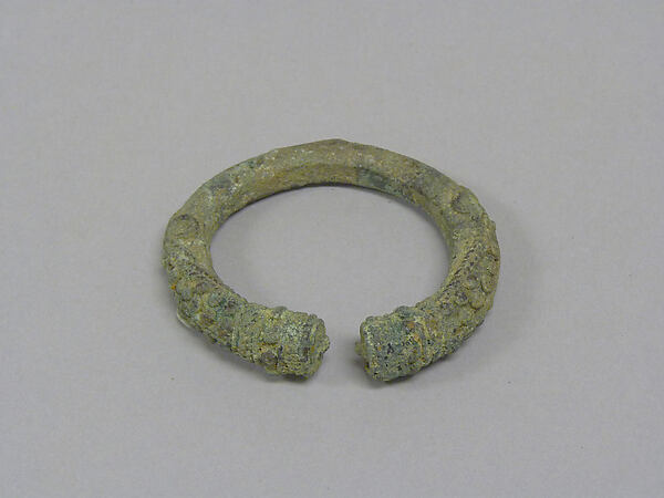 Open Solid Bangle with Applied End Decorations