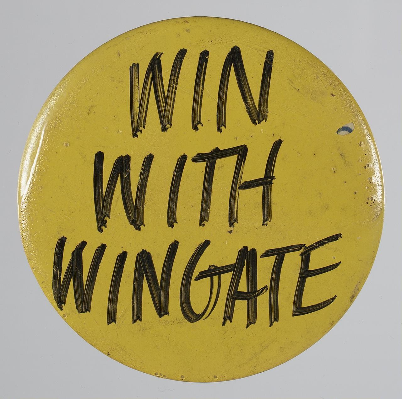 Pinback button reading "Win With Wingate"