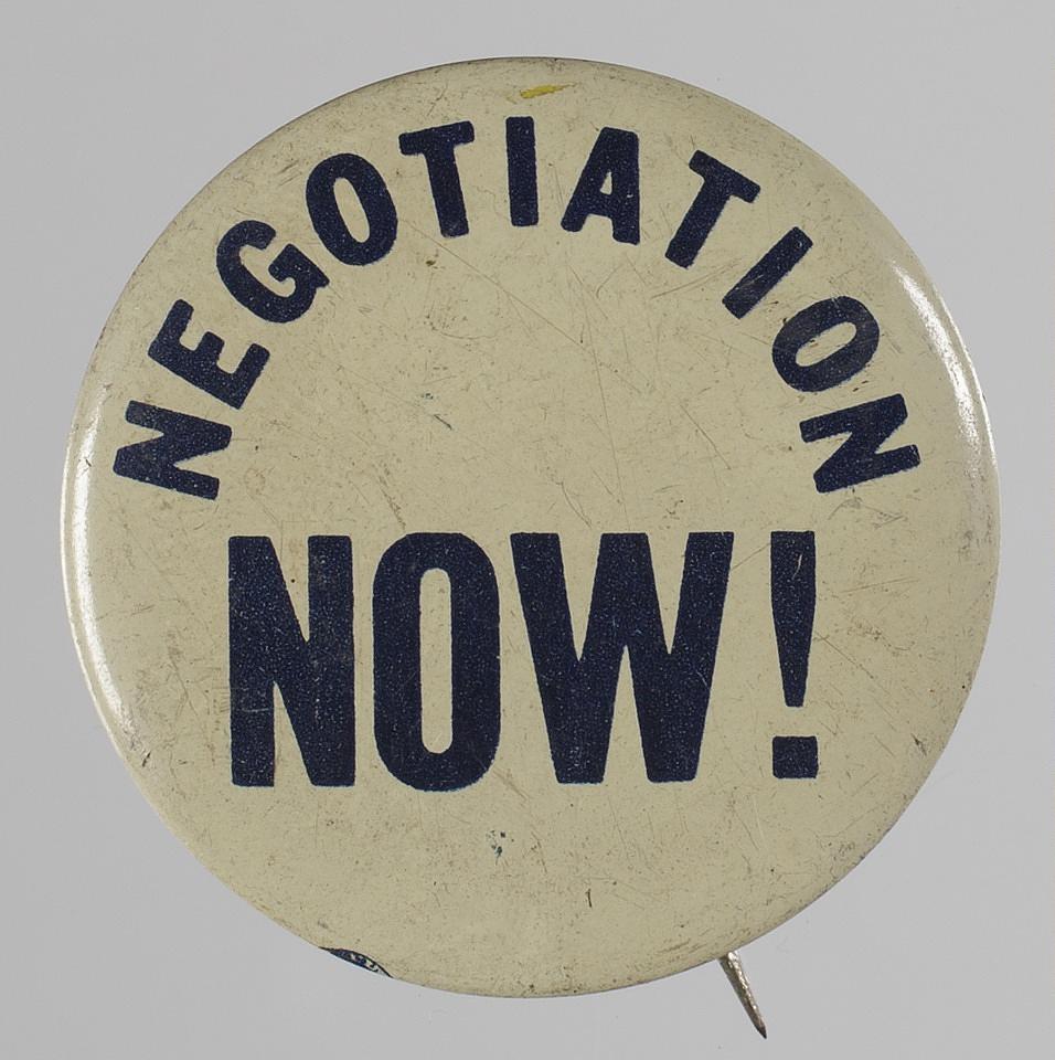 Pinback button with "Negotiation Now" slogan