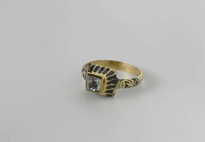 Ring with a table-cut diamond