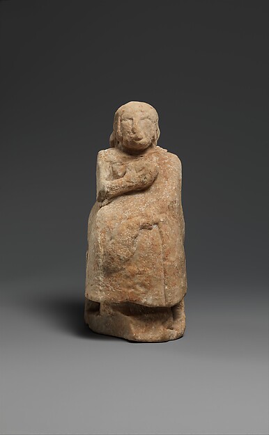 Seated female figure