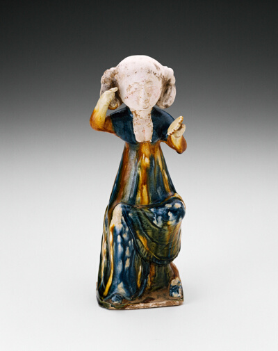 Seated Girl Holding Mirror