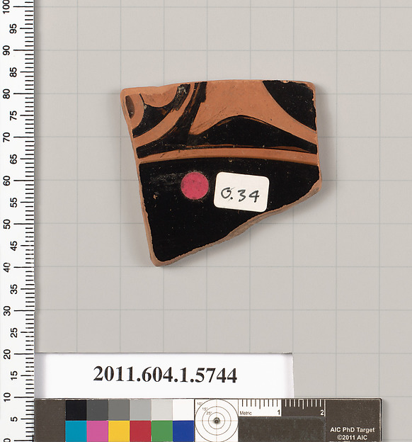 Terracotta fragment of a kylix: eye-cup  (drinking cup)