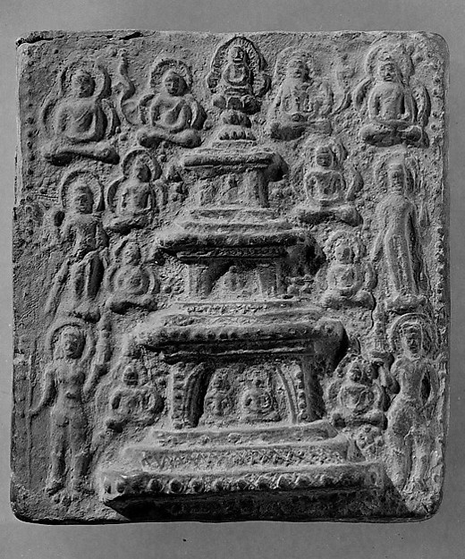 Tile with Buddha and a pagoda